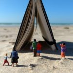 miniature figures, beach, notebook